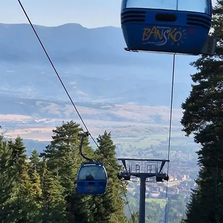 уютни планински с басейн в комплекс алпин лодж Apartment Bansko